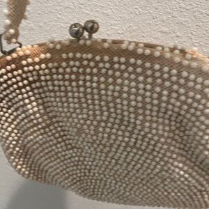 Vintage beaded   handbag with clasp  with pearl like embellishments